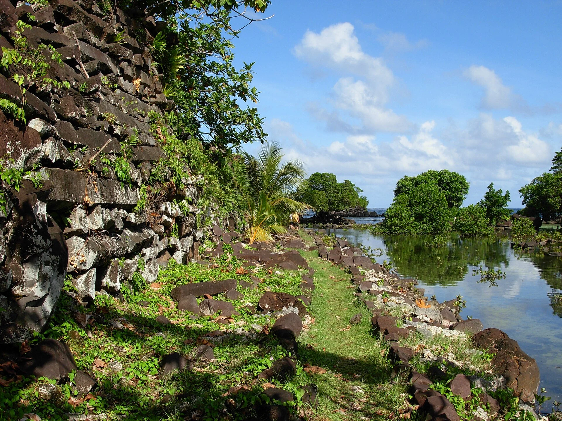Quiet navigation through a canal between Nan Madol islets.