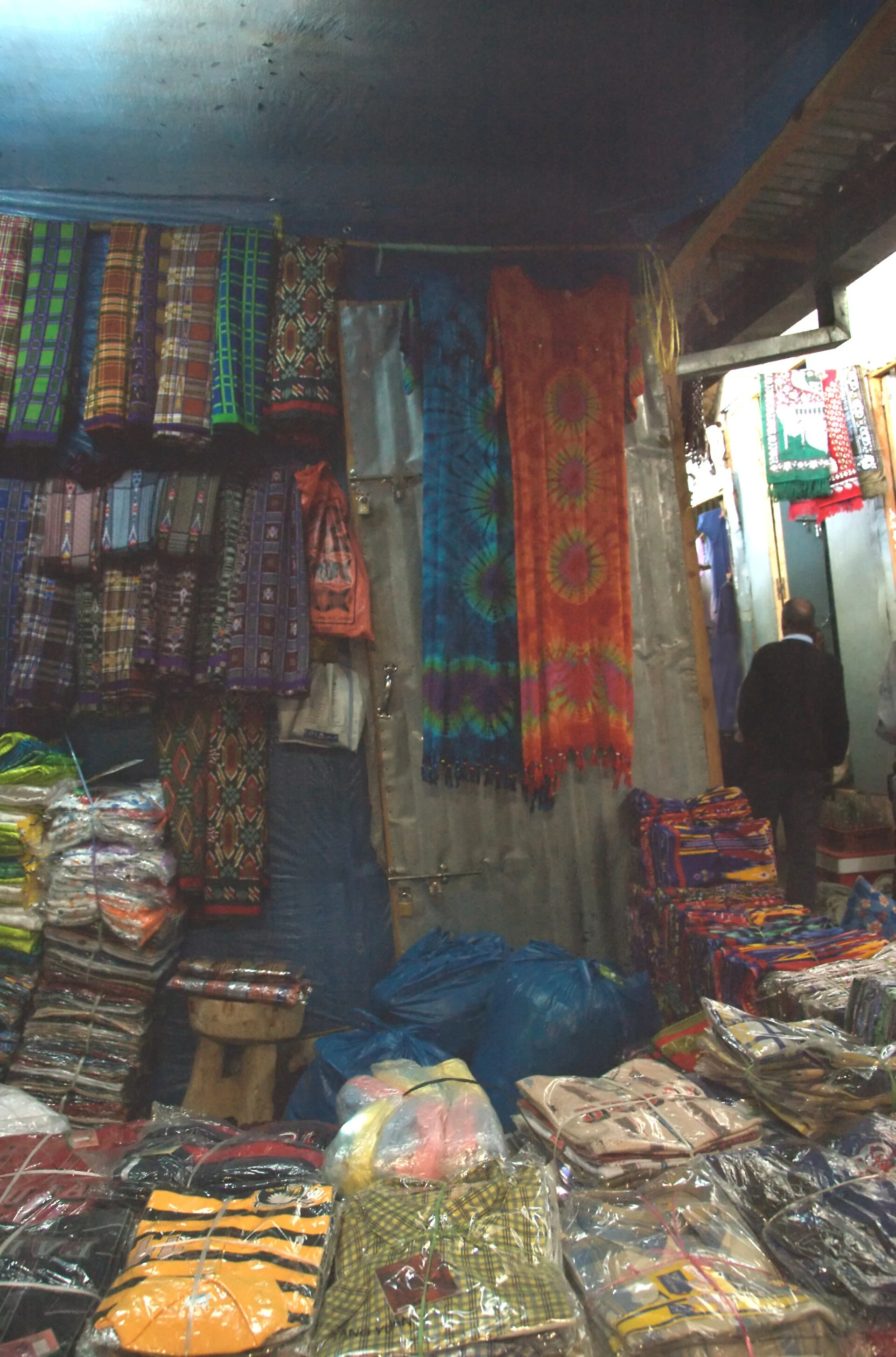 Fruit, spice and textile stalls in a Harar market.